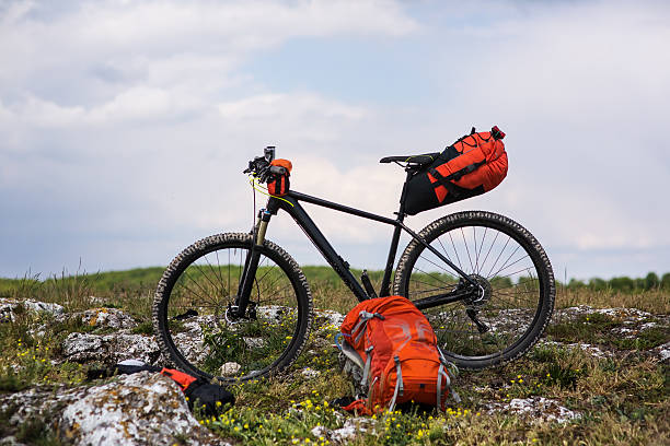 istock Bicycle with orange bags for travel 533717696