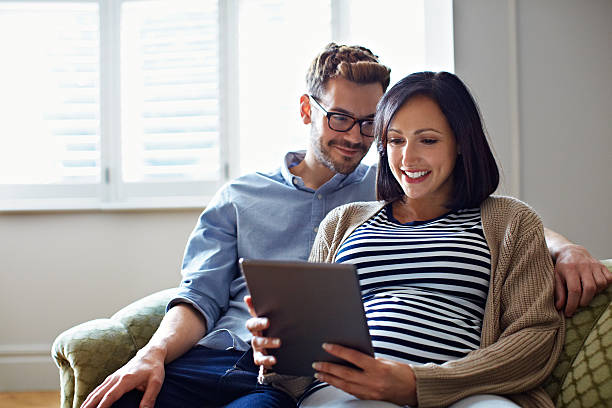 istock Reading up on soon to be parenting tips 533718438