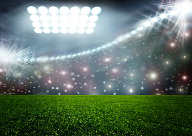 istock Soccer ball on green stadium arena 533722135