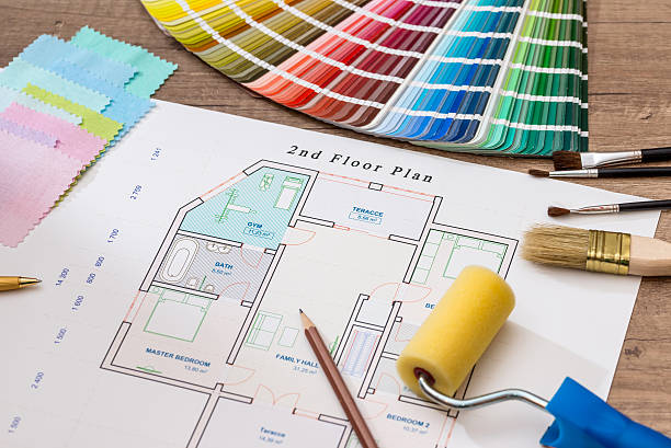 istock architectural drawings with color guide, paint roller, brushes, pencil 533722396