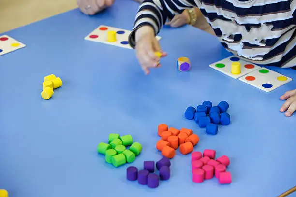 Photo of Children playing with homemade educational toys