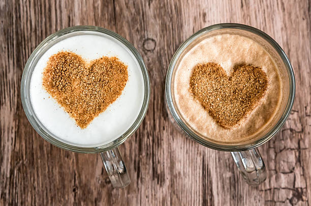 istock Cups of coffee with a heart shape symbol 533723844