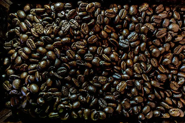 Low key image: Dark themetic coffee beans background