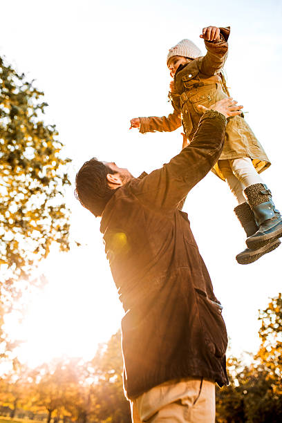 istock Father and daughter having fun at sunset. 533725301