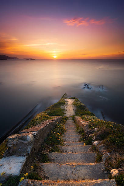 istock stone stairs down to the sea 533725584