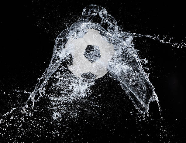 istock Water splash with sport ball 533741487