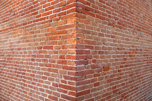 Corner brick wall