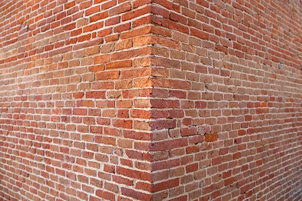 Corner brick wall.