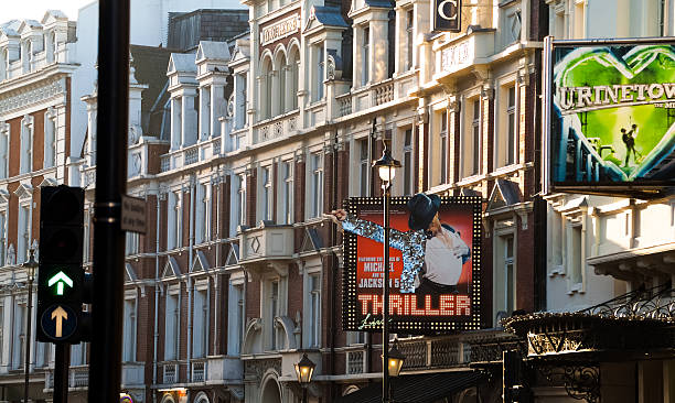 Shaftesbury Avenue London, UK - December 13, 2014: Performances, including Michael Jackson's Thriller, advertised outside the Lyric theater in Shaftesbury Avenue, Soho, London, on December 13th, 2014. album title stock pictures, royalty-free photos & images