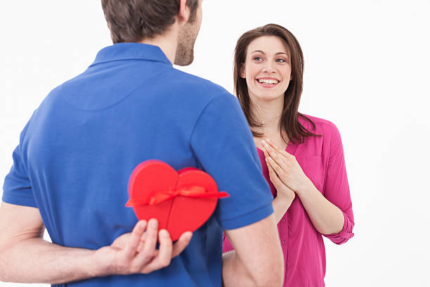 istock Man with gift box, woman smiling 533744013