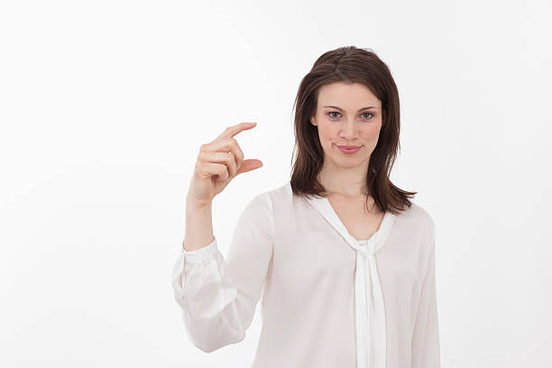 istock Young woman gesturing, portrait 533744365