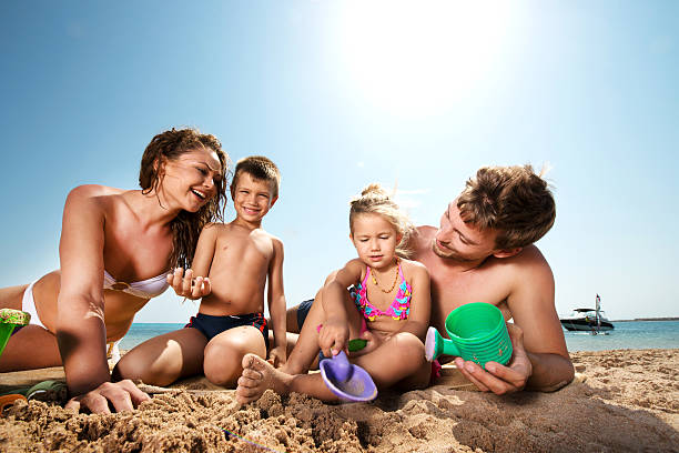 istock Playful family at the beach. 533746295