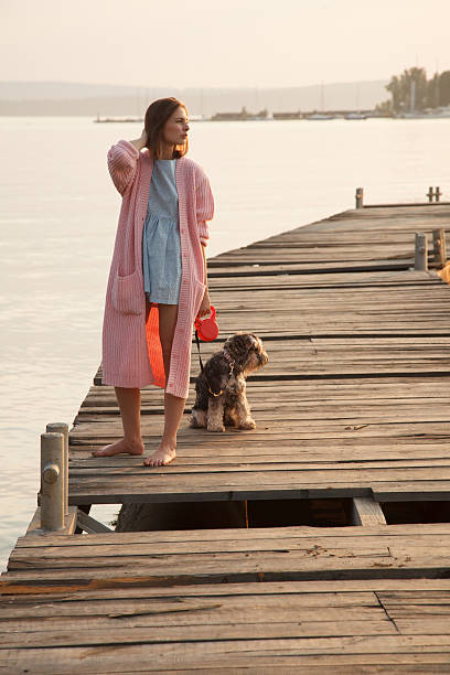 istock Young girl on pier 533746455