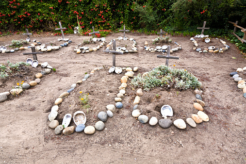 cemetery of Carmel Mission with graves of indians decorated with shells