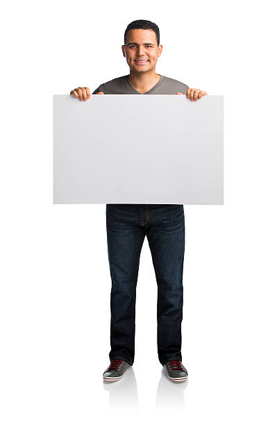 istock Happy man holding placard 533777117