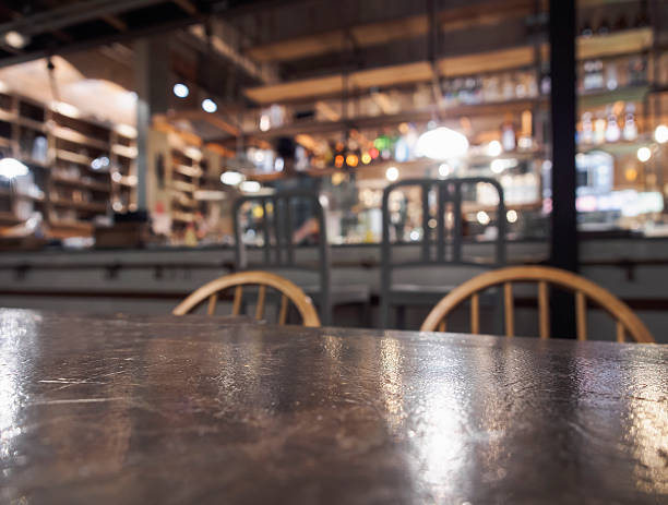 istock Top of table with Bar Restaurant blurred background with bartender 533778071