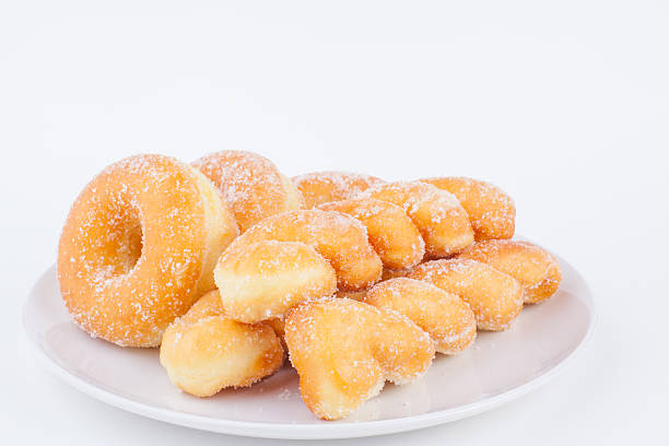 istock Delicious Sugar Ring Donut with a White paper Background 533779317