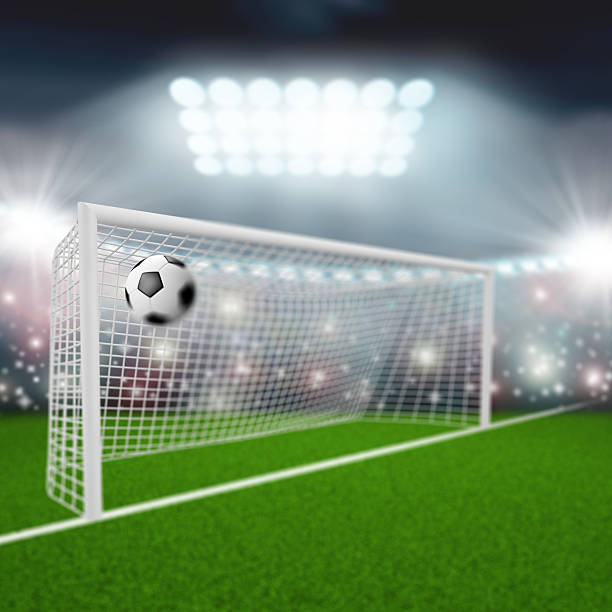 istock soccer ball flies into the goal 533780433