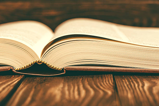 istock Vintage book on wooden background 533832341