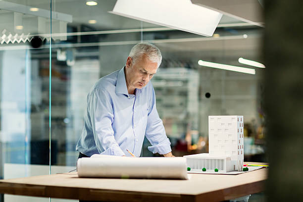 istock Mature Designer working in his office. 533832941