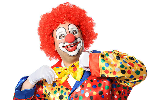 Clown Portrait of a smiling clown isolated on white circus clown carnival harlequin stock pictures, royalty-free photos & images