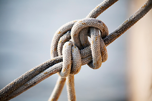 noose in a quay harbour - close up view with sea background