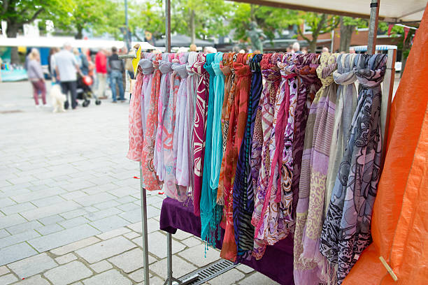 istock Colorful patterned scarfs  on a town square market 533834020