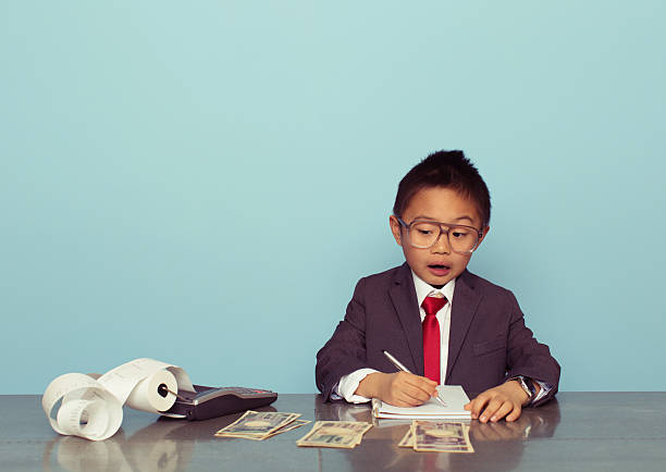 istock Young Japanese Business Boy is Counting Money 533835741