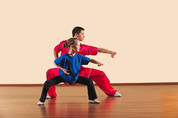 Mabu anzhang, Long Fist Style, Kung Fu instructor and girl stock photo