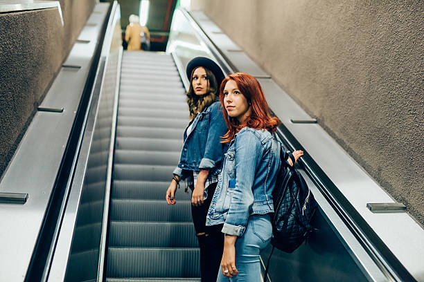 istock Two young handsome caucasian blonde and redhead on subway 533836700