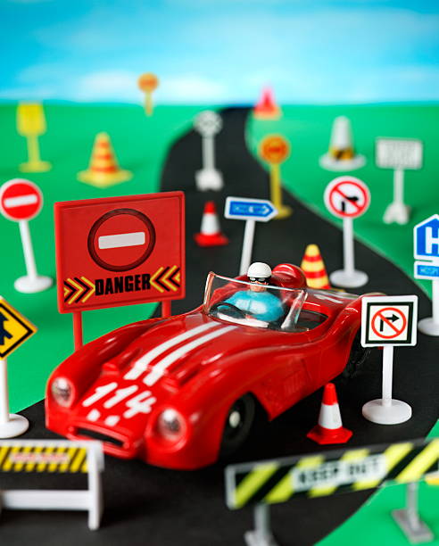 Plastic Toy Car on a Highway stock photo