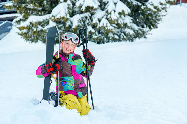istock Happy kid with skis 533838000