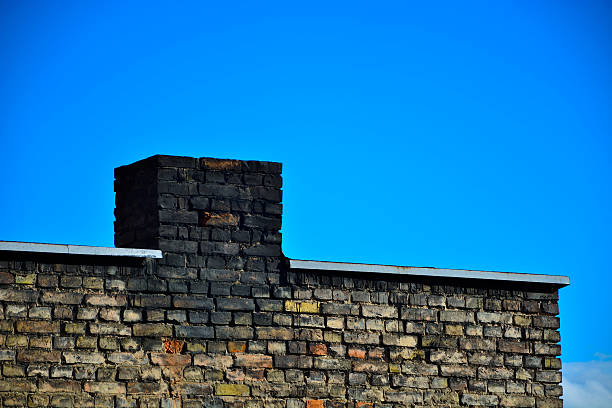 istock Old brick wall on a background of blue sky 533838077