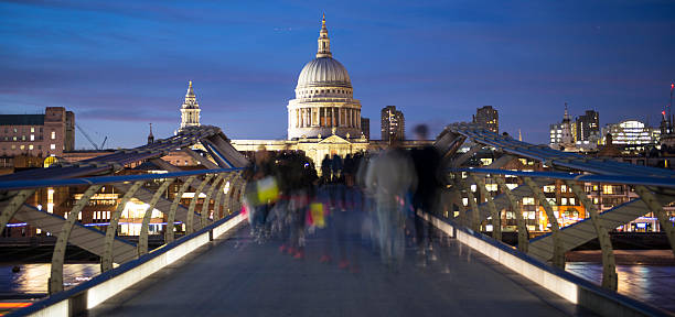 istock Shopper cross Millennium Bridge 533839562