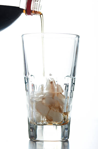 istock pouring soda in to glass 533843442