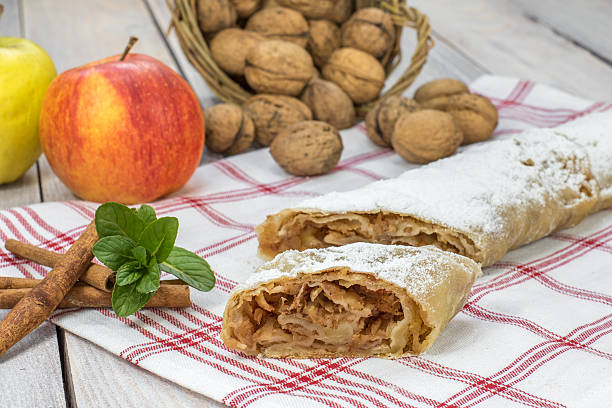 One Slice Homemade Apple Strudel with Cinnamon and Mint stock photo
