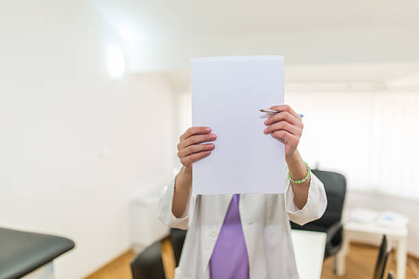 istock Doctor showing placard 533844736