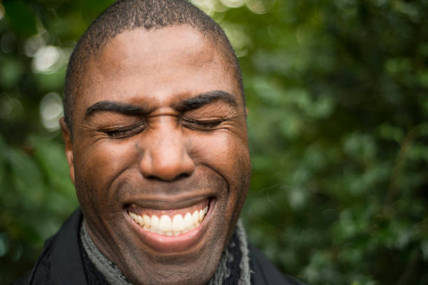 istock African Brazilian man laughing hysterically 533845088