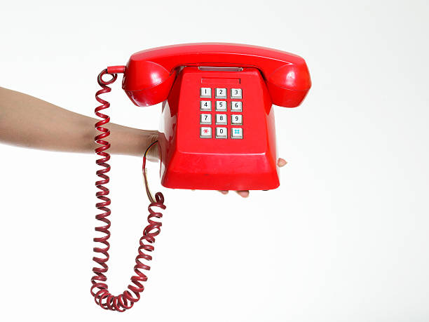 istock Woman holding old phone 533845656