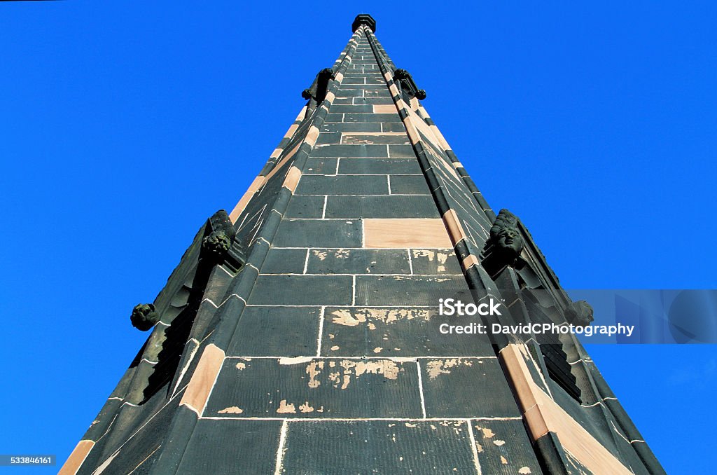 Priory Steeple A different view of a Priory steeple contrasting against a clear blue sky. 2015 Stock Photo