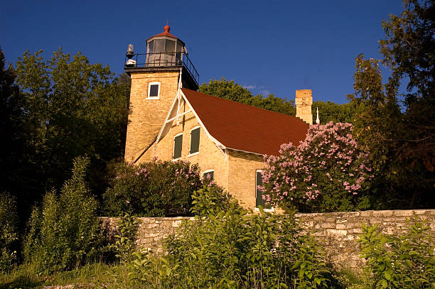 Sunset at Eagle Bluff Lighthouse in Door County Wisconsin stock photo