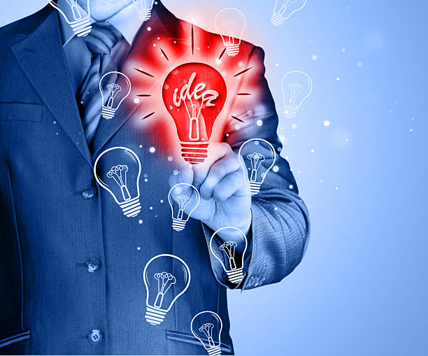 istock Business man touching light of idea 533847481