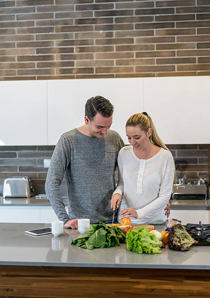 istock Couple cooking at home 533847650