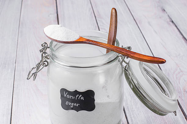 istock Teaspoon vanilla sugar placed on glass jar with vanilla sugar 533847670