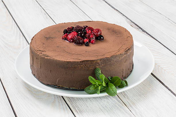 Chocolate cake with Ganache and berries fruit stock photo