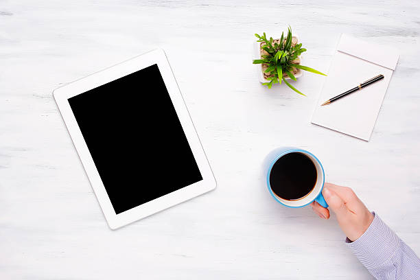 istock Top view of business man working on a tablet 533848032