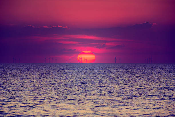 View of a sea wind farm at sunset in Margate, England
