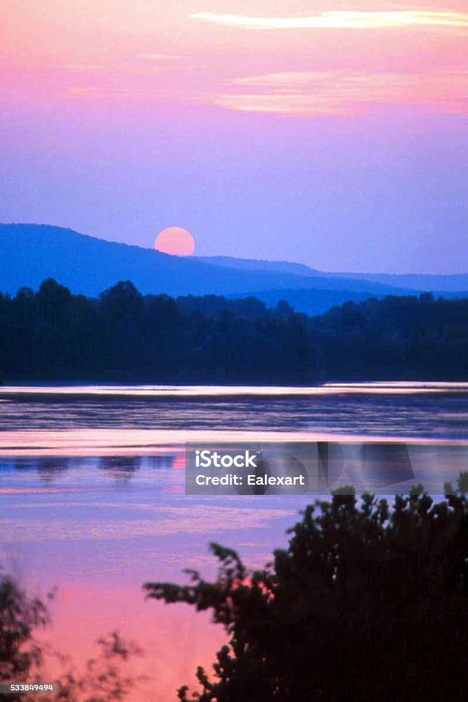 Sunset over Lake Guntersville Taken with my digital camera in late August at Lake Guntersville, AL. Lake Stock Photo