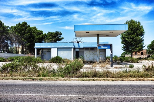An image of an old Abandoned Italian gas Station copyright-free status.