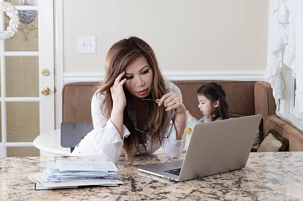 istock Worried single mother under financial strain 533853031